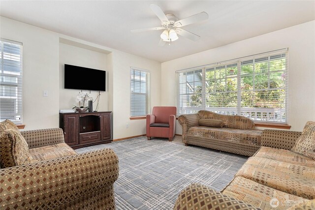 1339 Spruce St, Lynden, WA 98264 - carpeted living area featuring baseboards and ceiling fan