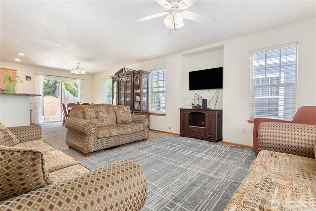 1339 Spruce St, Lynden, WA 98264 - living room with carpet flooring, ceiling fan, and a chandelier