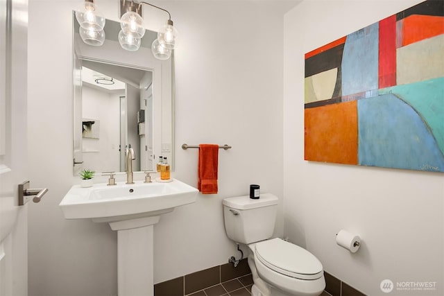 1920 4th Ave Unit 604, Seattle, WA 98101 - bathroom with tile patterned floors and toilet