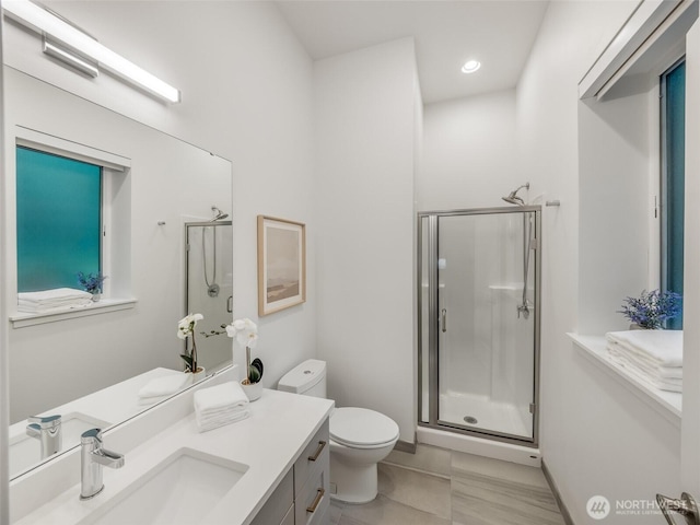 18517 96th Dr NE Unit A, Bothell, WA 98011 - full bathroom featuring vanity, a shower stall, and recessed lighting