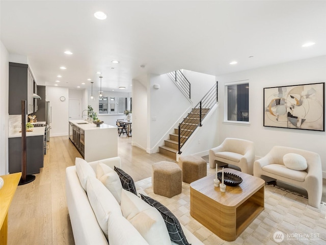 18517 96th Dr NE Unit A, Bothell, WA 98011 - living room featuring recessed lighting, stairs, and light wood-style flooring