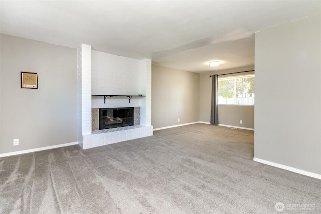 32206 27th Ave SW, Federal Way, WA 98032 - unfurnished living room with a brick fireplace and carpet floors