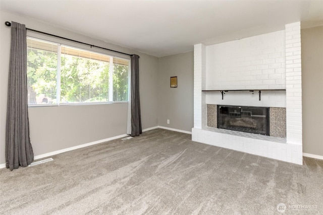 32206 27th Ave SW, Federal Way, WA 98032 - unfurnished living room featuring carpet flooring and a brick fireplace