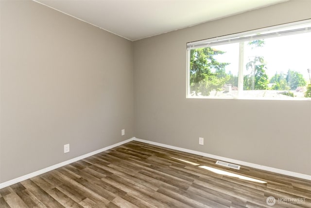 32206 27th Ave SW, Federal Way, WA 98032 - spare room with wood finished floors and baseboards