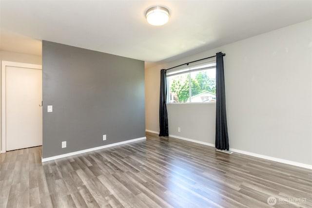 32206 27th Ave SW, Federal Way, WA 98032 - unfurnished room featuring wood finished floors