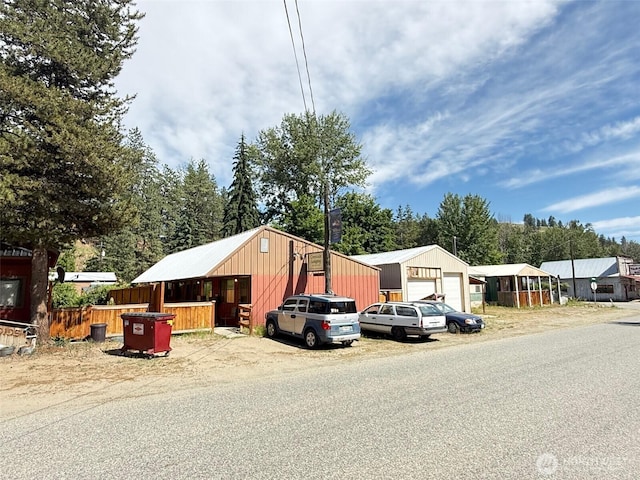 408 Main St, Conconully, WA 98844 - view of front facade featuring a detached garage
