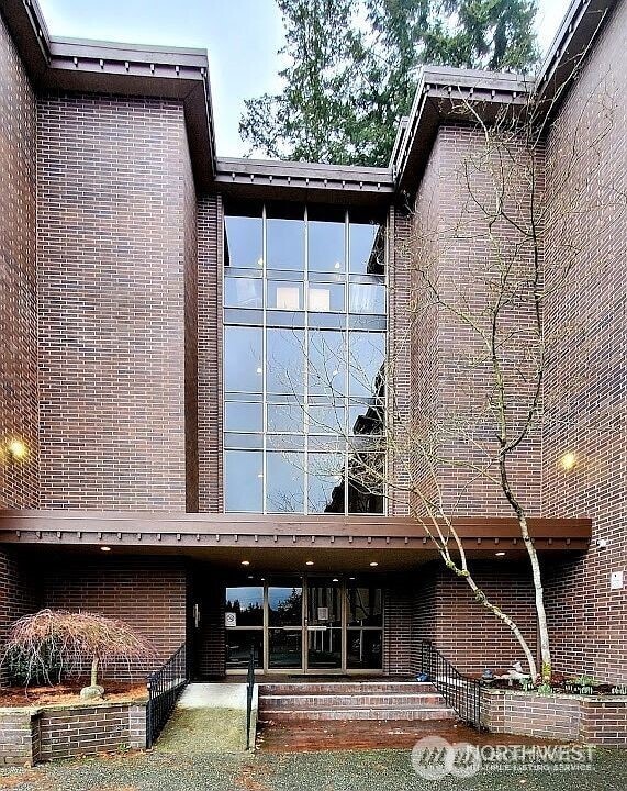 5915 Highway Pl Unit 403, Everett, WA 98203 - view of exterior entry featuring brick siding