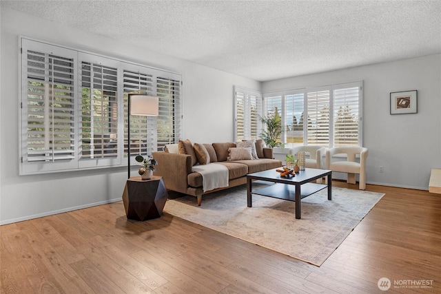 5915 Highway Pl Unit 403, Everett, WA 98203 - living room with a textured ceiling and wood finished floors