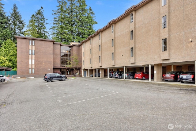 5915 Highway Pl Unit 403, Everett, WA 98203 - view of property featuring uncovered parking