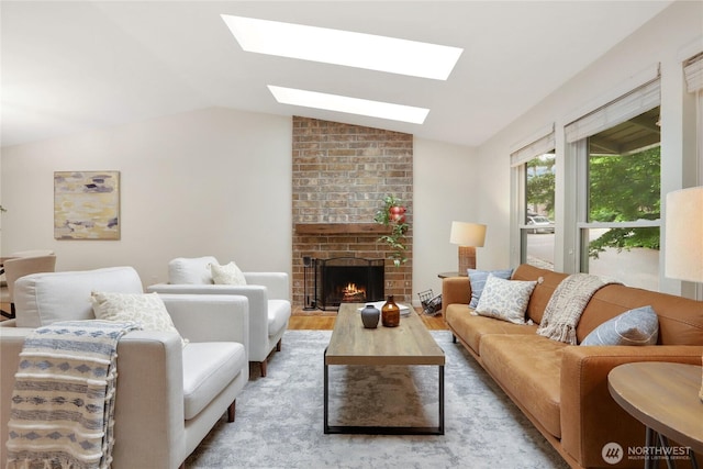 10435 NE 135th Pl, Kirkland, WA 98034 - living room featuring a skylight, lofted ceiling, a fireplace, and light wood-type flooring