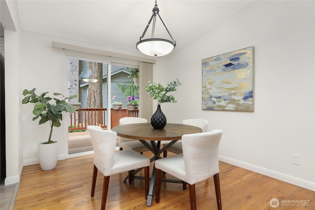 10435 NE 135th Pl, Kirkland, WA 98034 - dining space with baseboards and light wood-style flooring