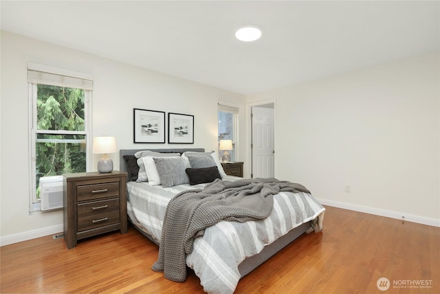 10435 NE 135th Pl, Kirkland, WA 98034 - bedroom with baseboards and light wood-style floors