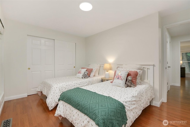 10435 NE 135th Pl, Kirkland, WA 98034 - bedroom with wood finished floors and a closet
