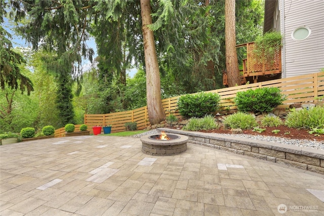 10435 NE 135th Pl, Kirkland, WA 98034 - view of patio featuring an outdoor fire pit