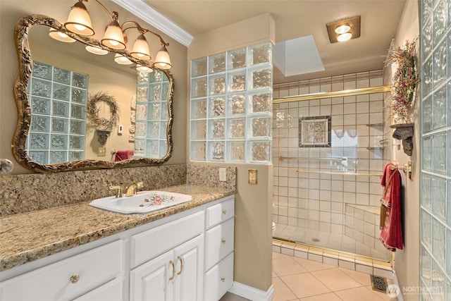 6600 Klein St NW, Olympia, WA 98502 - full bathroom with vanity, a shower stall, tile patterned flooring, and crown molding