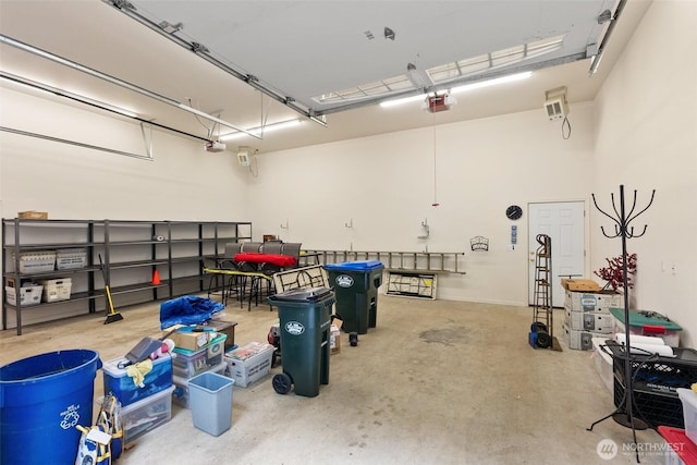 6600 Klein St NW, Olympia, WA 98502 - garage featuring a garage door opener