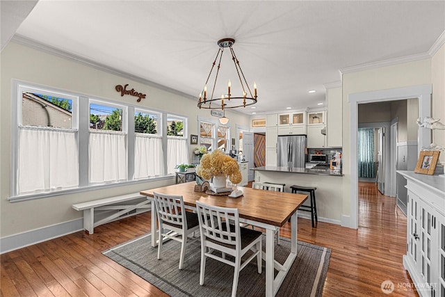 206 S Miller St, Wenatchee, WA 98801 - dining area with crown molding, a chandelier, hardwood / wood-style flooring, baseboards, and recessed lighting