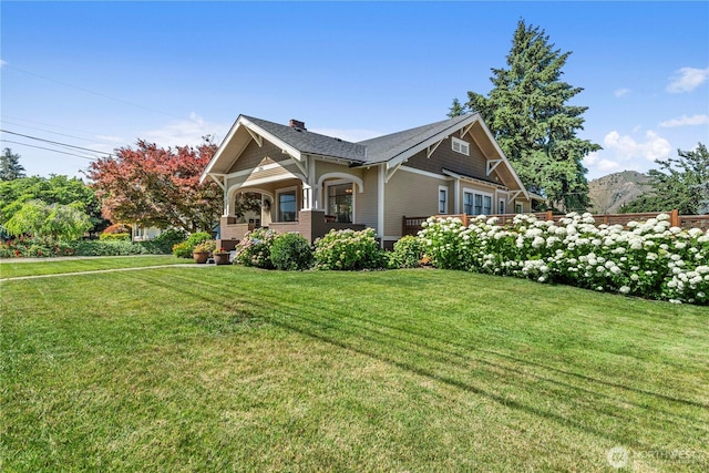 206 S Miller St, Wenatchee, WA 98801 - view of front of home featuring a front lawn and a chimney