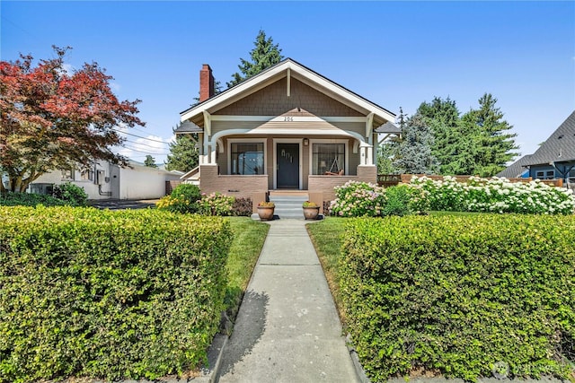 206 S Miller St, Wenatchee, WA 98801 - view of front facade with a chimney and a porch