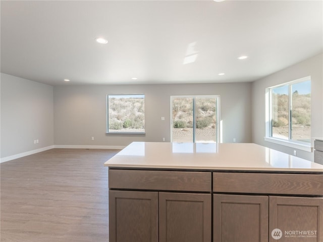 22 Salmon Dr, Wenatchee, WA 98801 - kitchen featuring light wood-style flooring, light countertops, recessed lighting, and open floor plan