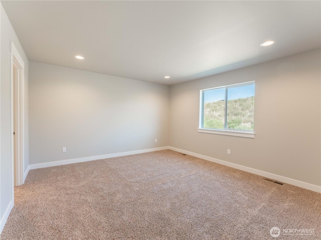 22 Salmon Dr, Wenatchee, WA 98801 - spare room featuring recessed lighting and light colored carpet