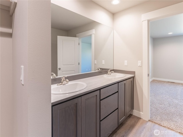 22 Salmon Dr, Wenatchee, WA 98801 - bathroom with double vanity, wood finished floors, and recessed lighting