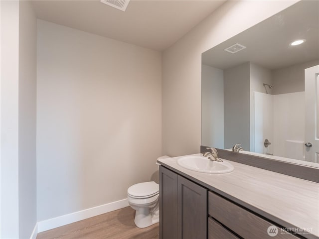 22 Salmon Dr, Wenatchee, WA 98801 - bathroom with wood finished floors, vanity, a shower, and recessed lighting