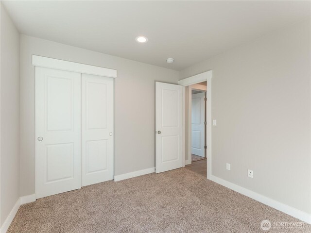 22 Salmon Dr, Wenatchee, WA 98801 - unfurnished bedroom featuring carpet flooring, a closet, and recessed lighting