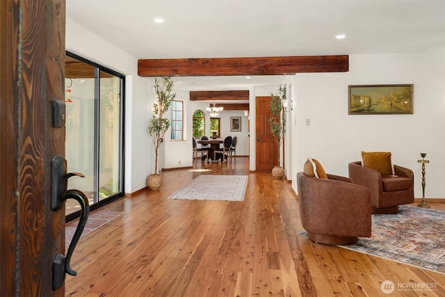 24917 Dockton Rd SW, Vashon, WA 98070 - entrance foyer featuring light wood-style flooring, recessed lighting, beam ceiling, and a chandelier