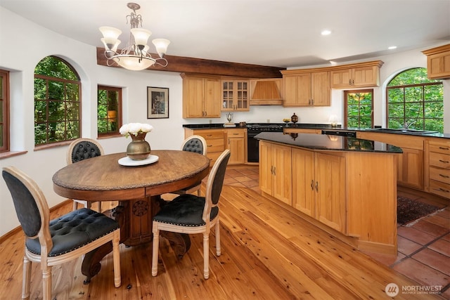 24917 Dockton Rd SW, Vashon, WA 98070 - dining space featuring a chandelier, recessed lighting, and light wood-style floors