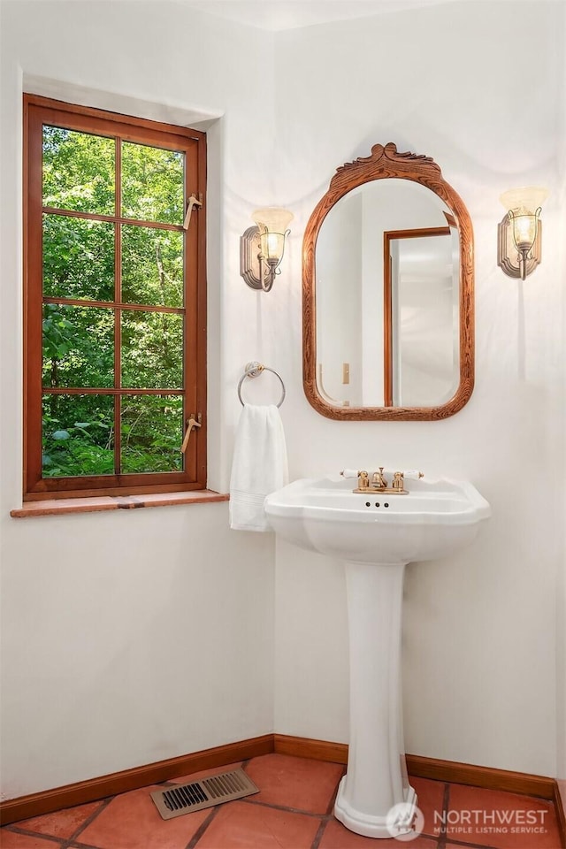 24917 Dockton Rd SW, Vashon, WA 98070 - bathroom featuring baseboards and tile patterned flooring