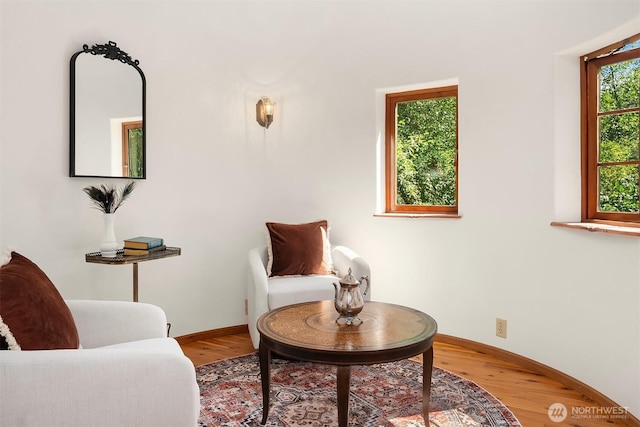 24917 Dockton Rd SW, Vashon, WA 98070 - sitting room featuring wood finished floors and baseboards