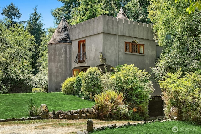 24917 Dockton Rd SW, Vashon, WA 98070 - view of side of property with a yard and stucco siding