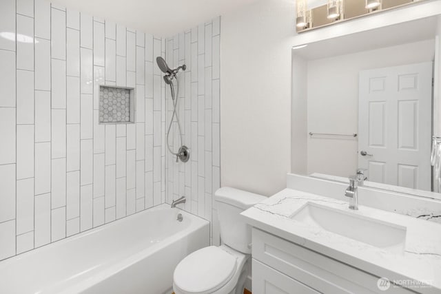 2020 Grant Ave S Unit B103, Renton, WA 98055 - full bathroom featuring toilet, vanity, and bathtub / shower combination