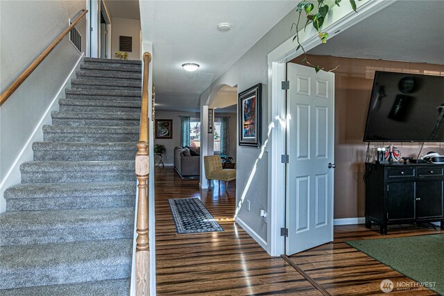 17716 25th Ave E, Tacoma, WA 98445 - stairs featuring wood finished floors and arched walkways