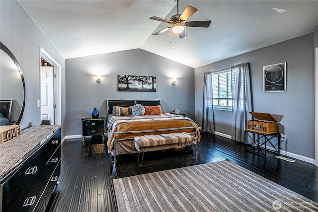 17716 25th Ave E, Tacoma, WA 98445 - bedroom featuring vaulted ceiling, dark wood finished floors, and ceiling fan