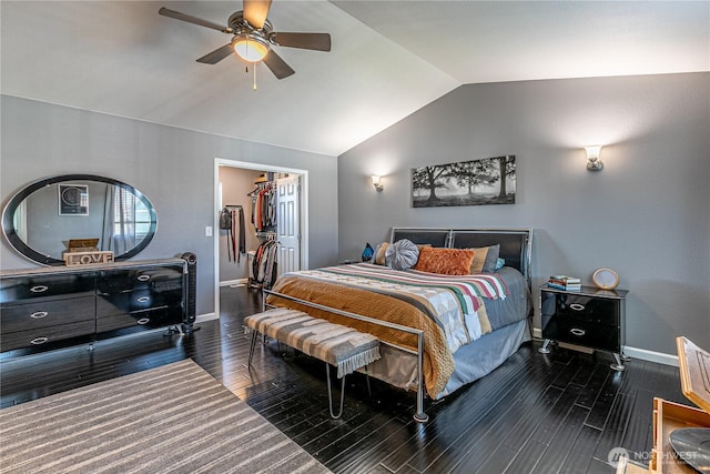 17716 25th Ave E, Tacoma, WA 98445 - bedroom with vaulted ceiling, a spacious closet, wood finished floors, a closet, and a ceiling fan