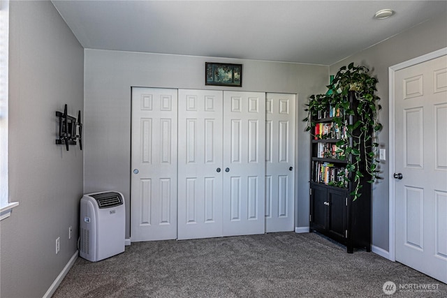 17716 25th Ave E, Tacoma, WA 98445 - carpeted bedroom with a closet and baseboards