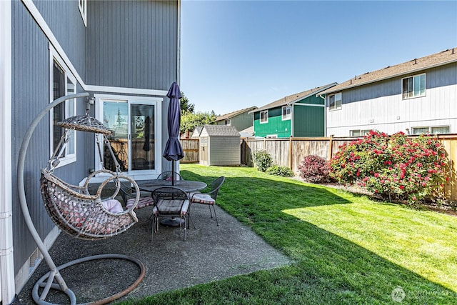 17716 25th Ave E, Tacoma, WA 98445 - fenced backyard with a storage shed, a residential view, and a patio area