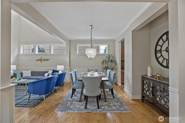 13020 112th Ave NE, Kirkland, WA 98034 - dining room featuring a chandelier, crown molding, and light wood-type flooring