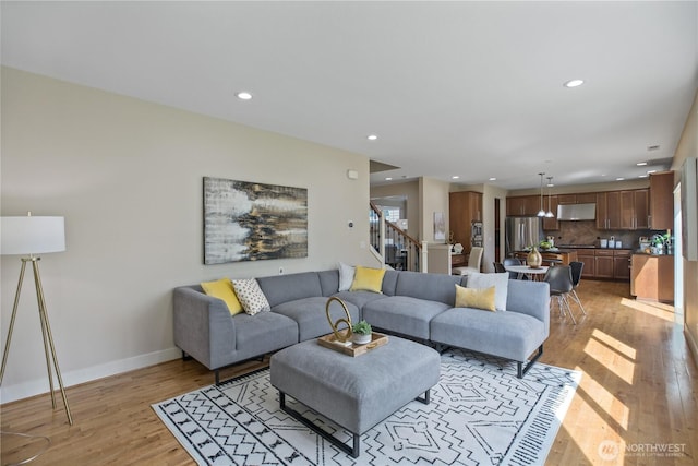 13020 112th Ave NE, Kirkland, WA 98034 - living area featuring recessed lighting, light wood-style flooring, and stairs