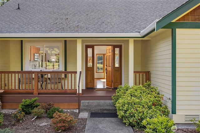 115 Quarry Rd, Port Ludlow, WA 98365 - view of exterior entry featuring a shingled roof and a porch