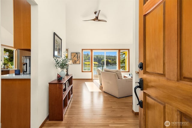 115 Quarry Rd, Port Ludlow, WA 98365 - foyer featuring light wood finished floors and high vaulted ceiling