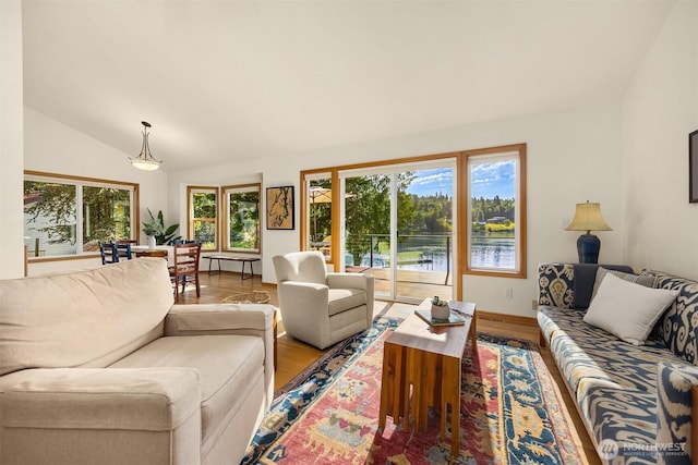 115 Quarry Rd, Port Ludlow, WA 98365 - living room with vaulted ceiling and light wood finished floors