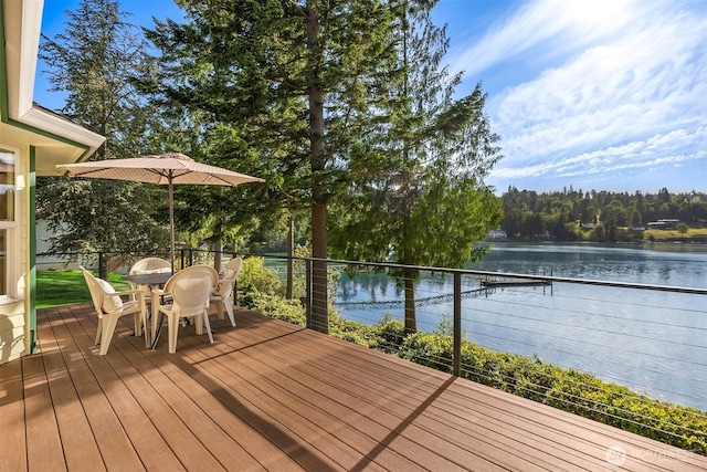 115 Quarry Rd, Port Ludlow, WA 98365 - wooden deck featuring a water view and outdoor dining space