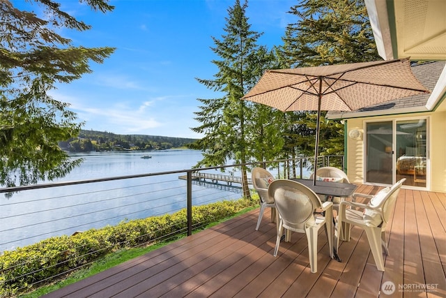 115 Quarry Rd, Port Ludlow, WA 98365 - wooden deck featuring a water view and outdoor dining area