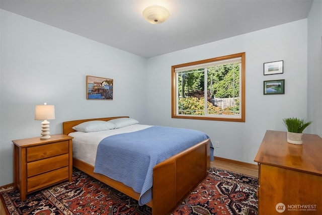 115 Quarry Rd, Port Ludlow, WA 98365 - bedroom with wood finished floors and baseboards