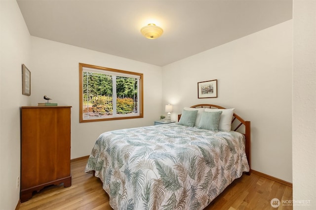 115 Quarry Rd, Port Ludlow, WA 98365 - bedroom with wood finished floors and baseboards