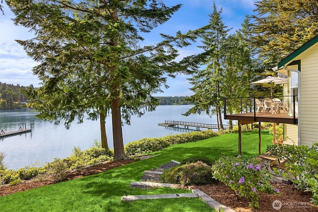 115 Quarry Rd, Port Ludlow, WA 98365 - view of green lawn with a dock and a deck with water view
