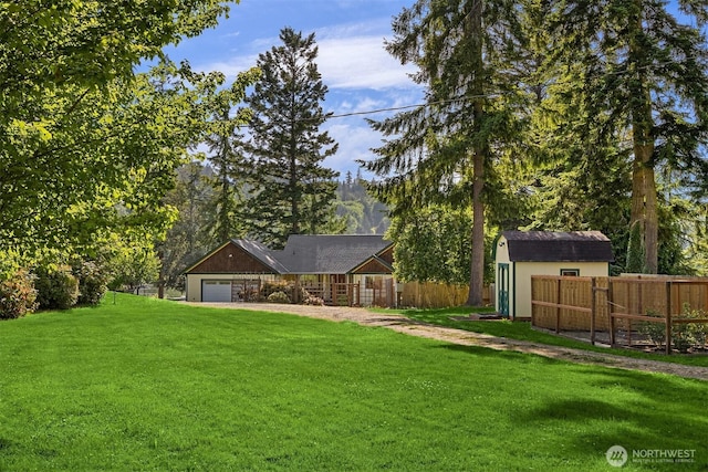 115 Quarry Rd, Port Ludlow, WA 98365 - view of front of home featuring a shed and an attached garage